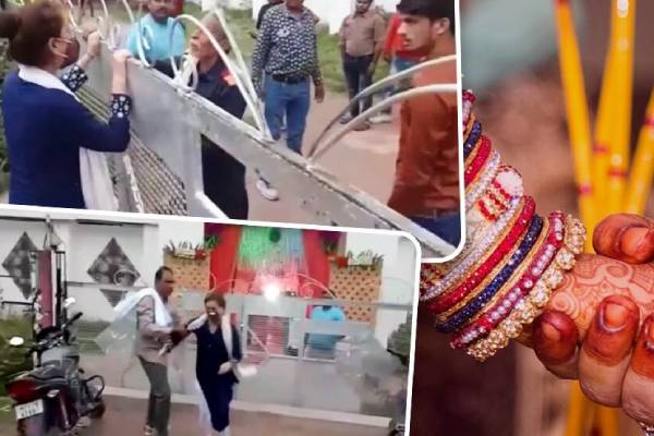 A woman waits outside the wedding venue as lover gets married